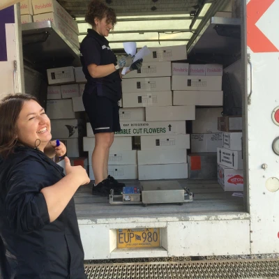 Filling up the Fed Ex truck with beautiful peonies headed out for special occasions